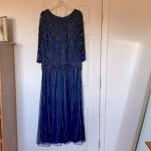 Formal dress, navy blue with all over sequins and beading. 16w worn once.